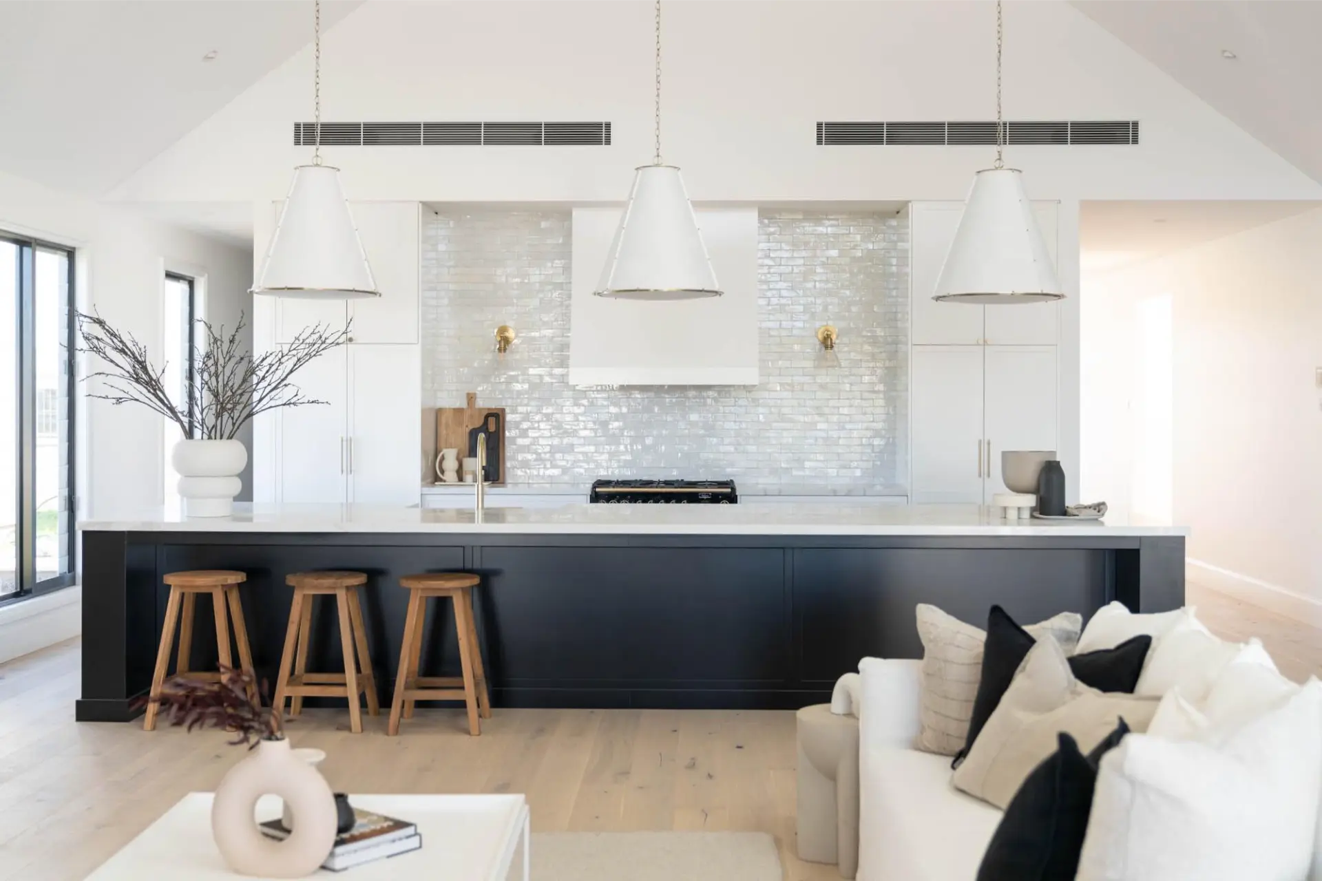 Ducted air conditioning outlets in an open-plan kitchen and living area